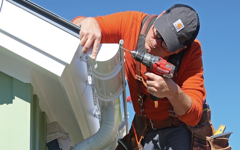 Why Gutters and Downspouts Are Essential for a Healthy Roof